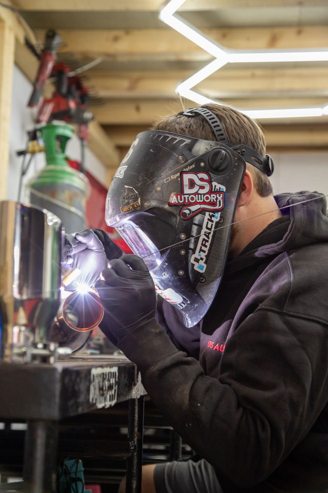 TIG welding a custom exhaust system at DS Autoworx — behind-the-scenes automotive photography by See You In Action